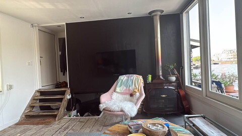 This is the entrace on the left, and the fireplace with a small storage area below deck